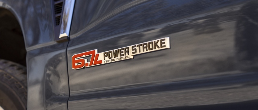 6.7L Power Stroke Turbo Diesel badge on a Ford Super Duty truck door.